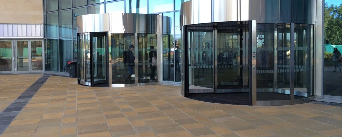 What are the 5 Not-So-Obvious Benefits of Revolving Doors?